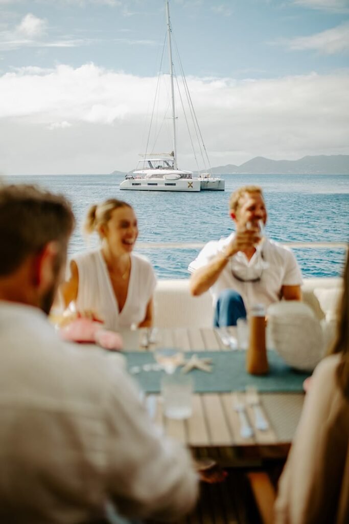 Guests toasting on a Goa yacht rent for milestone celebration